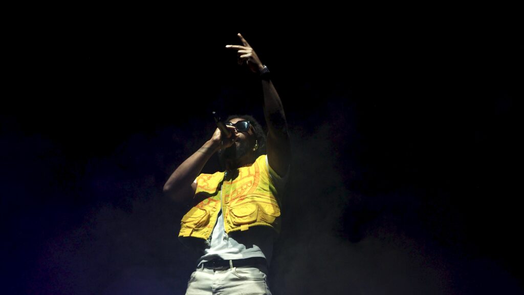 Members of EARTHGANG on stage at the Gorillaz Concert.