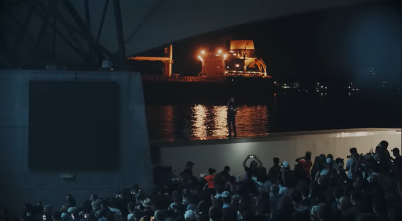Above: Ambrose jumping on top of an equipment truck and yelling “I’m on the truck!” after being told by the Detroit River Coast Guard they could, infact, not jump onto spectating boats @ Aretha Franklin Amphitheater