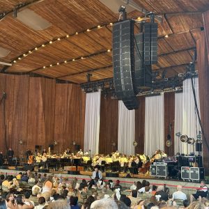 1 A photo of the Blossom Music Center stage with the Cleveland Orchestra on stage.